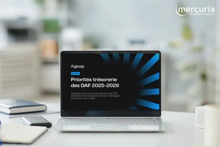 ordinateur sur une table avec écran ouvert sur une étude de gestion financière